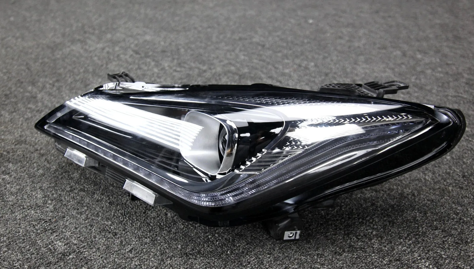 Headlamp part close-up showing lens and housing detail