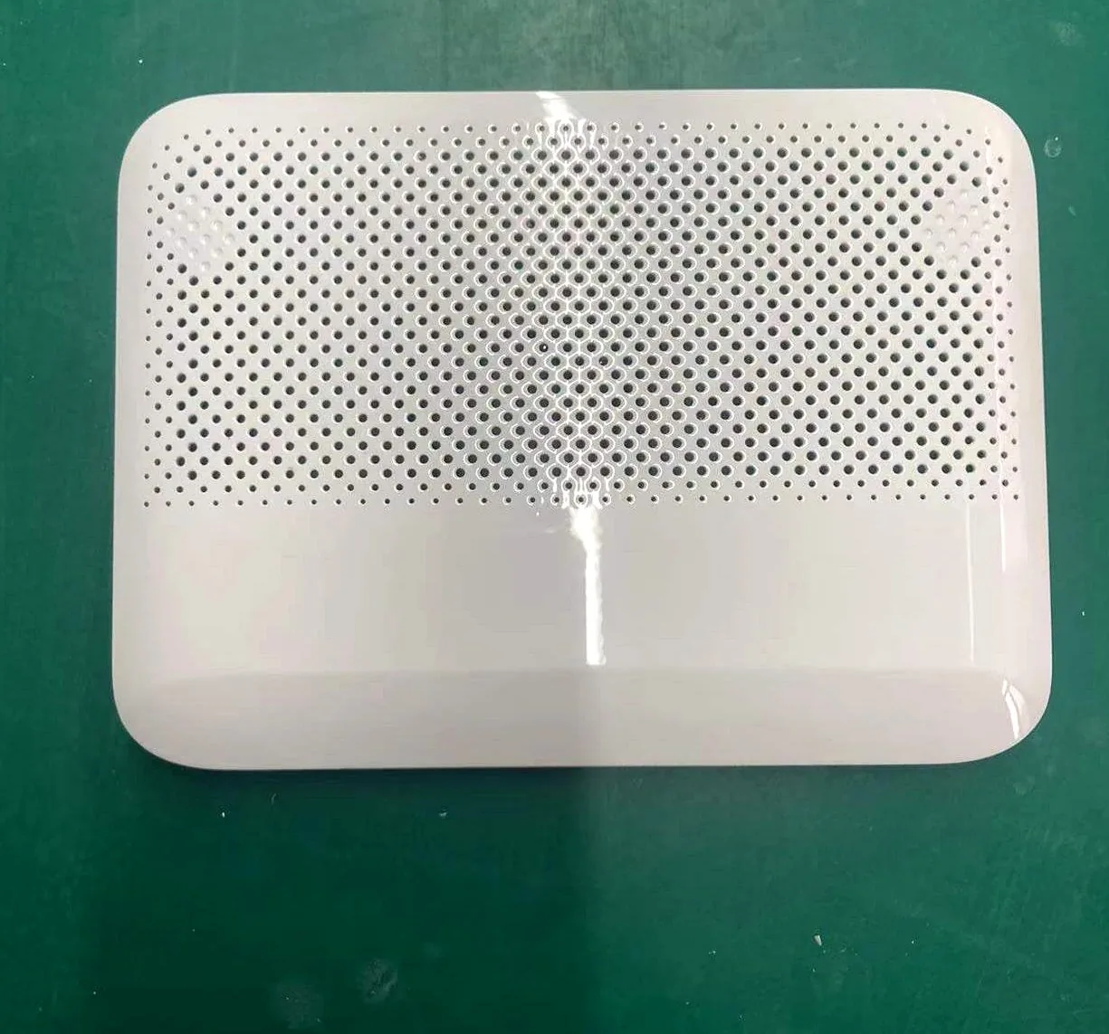 Perforated enclosure front cover, painted glossy white